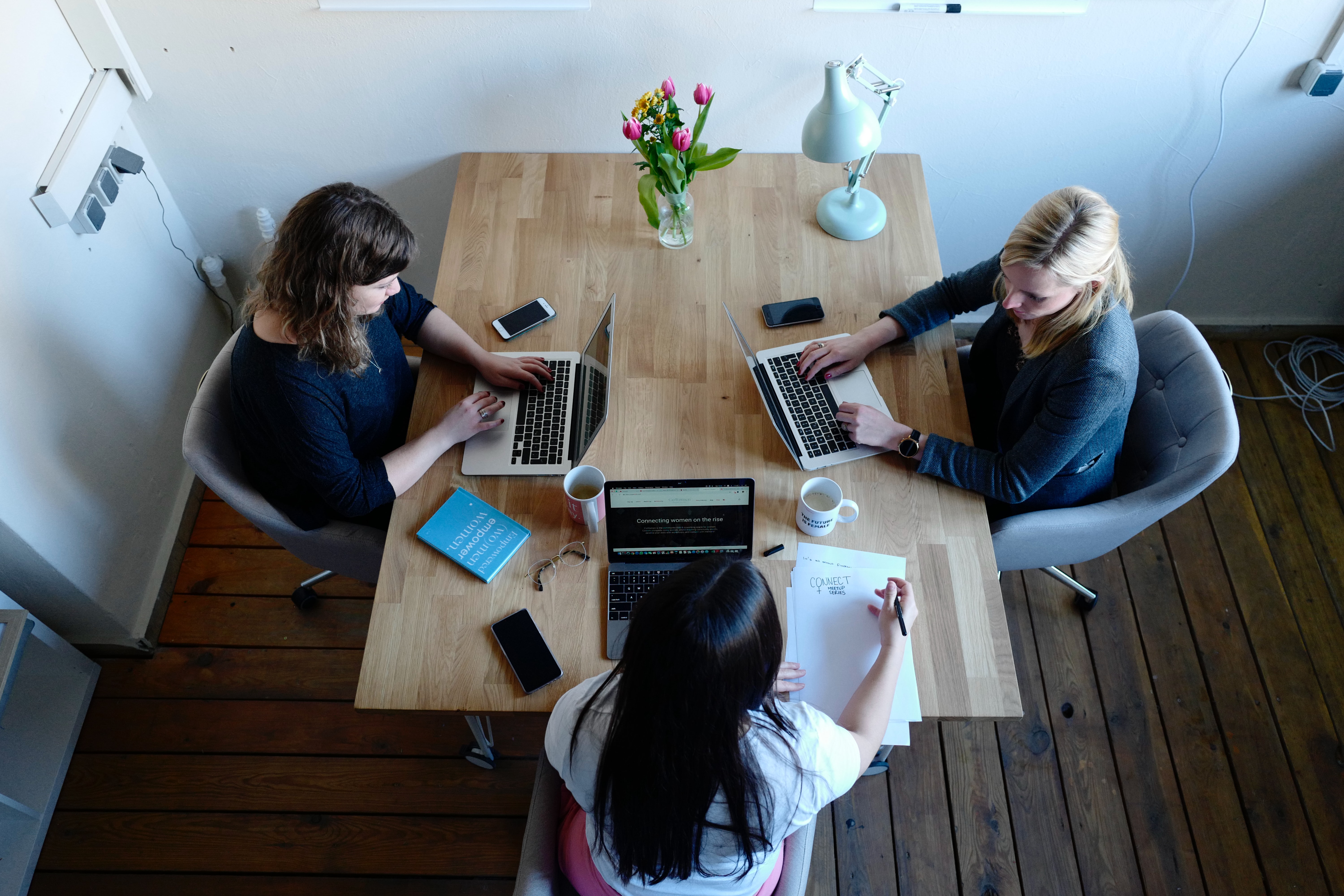 3 females working on their respective laptops in the workplace - Small Business Ideas - Josei Life