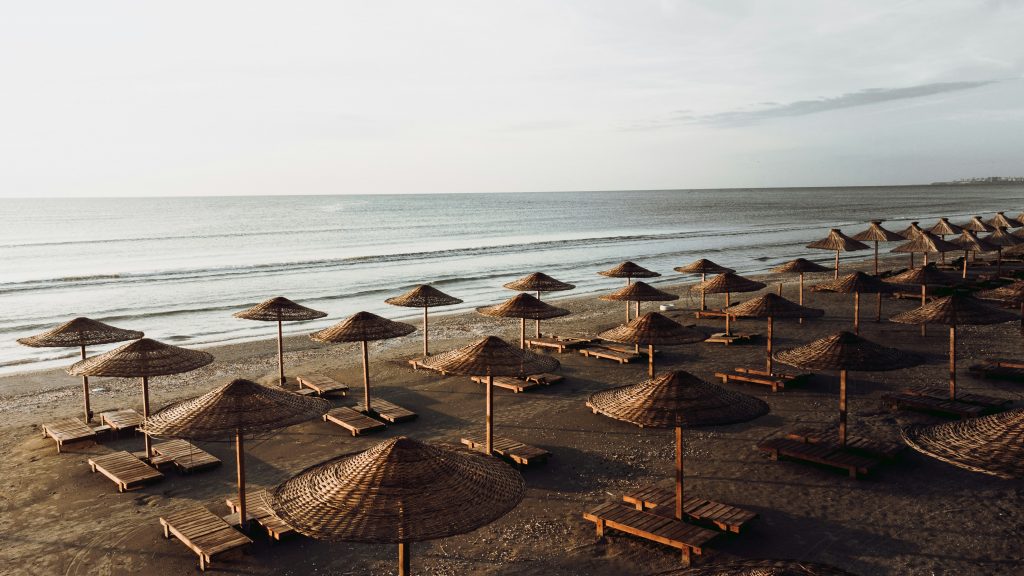 beach umbrellas and chair sets - 25 Hotel Marketing Ideas to Drive More Bookings in 2025 - Josei Life Agency 